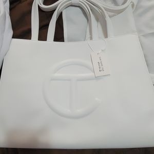 Telfar, gucci Alexander wang , coach Zara